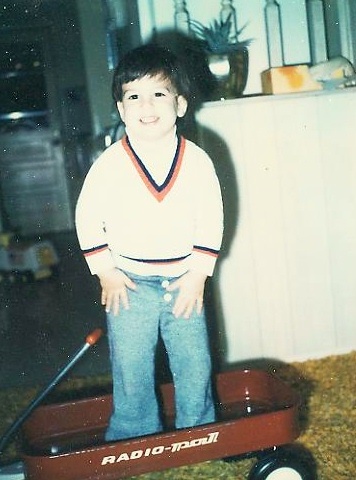 Joel Riding in a Radio Flyer